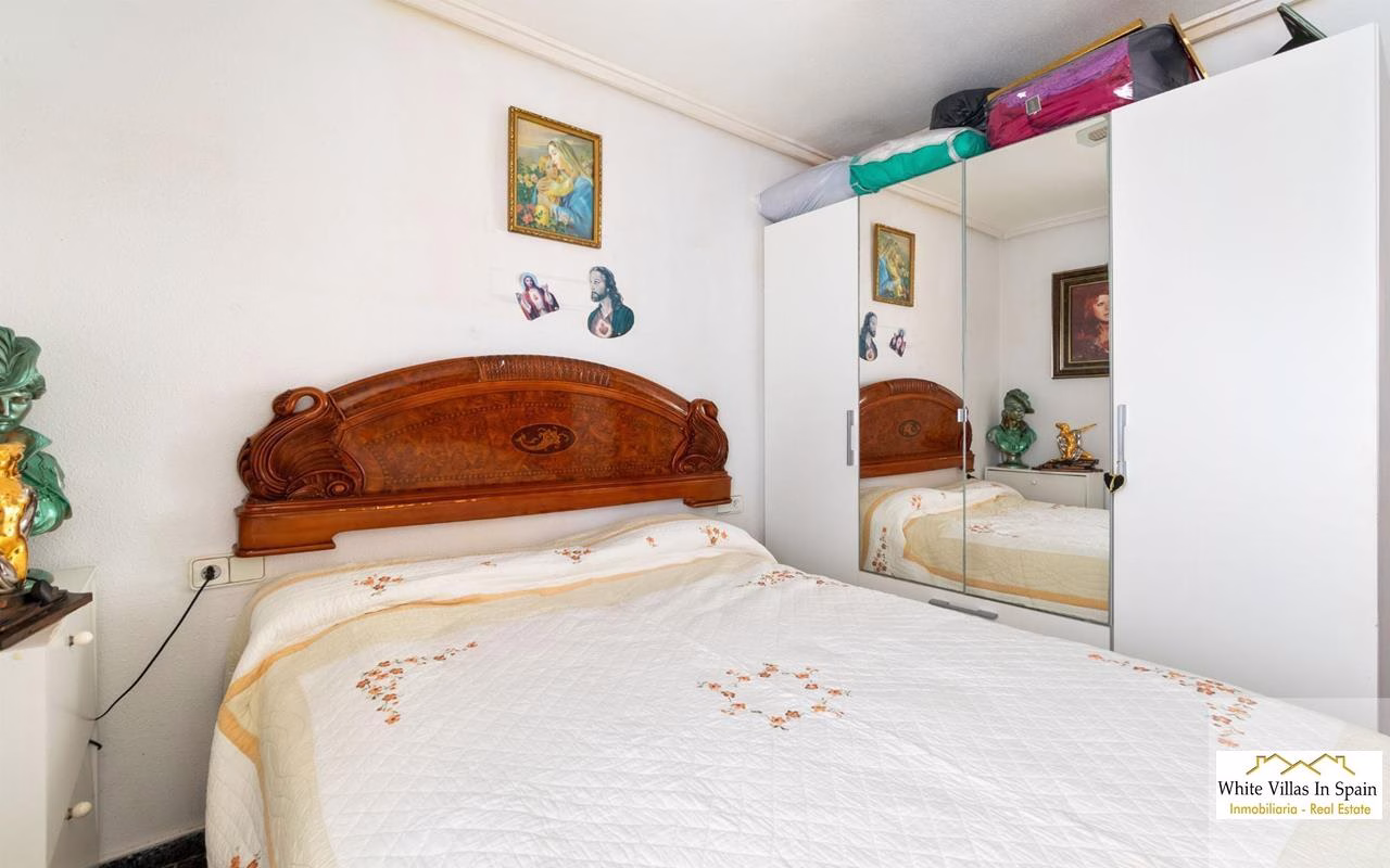 WV2593_2 Bedrooms Apartment on 2nd Floor with comm. Pool, Terrace and Lift Access_ Punta Prima_Torrevieja | White Villas in Spain WhiteVillasInSpain16 18