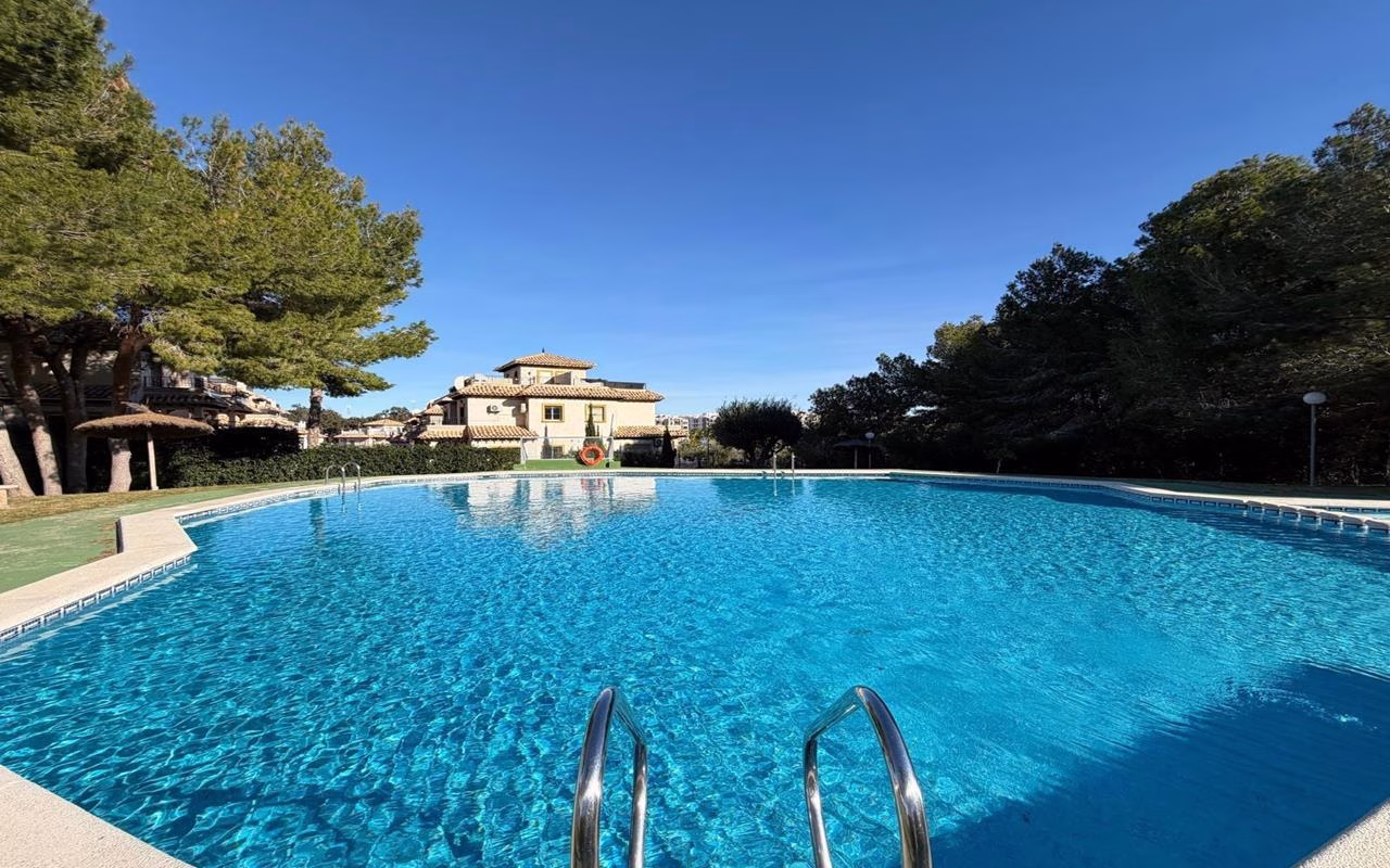 WV2604_2 Bedrooms Corner TownHouse with comm. Pool, Off-Road Parking, Glazed-In Terrace, Parking and Solarium with Sea Views_LAS FILIPINAS_VILLAMARTIN | White Villas in Spain WhiteVillasInSpain01 23
