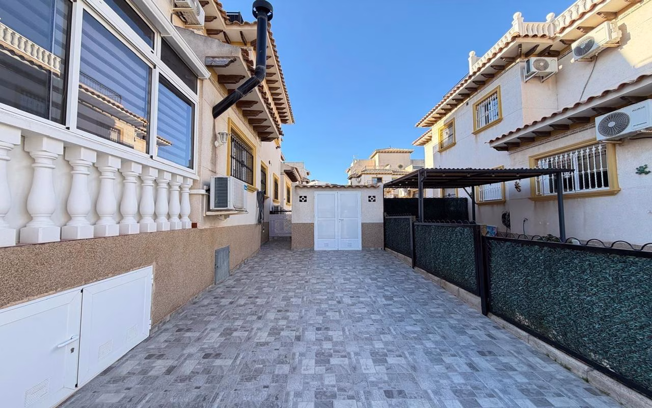 WV2604_2 Bedrooms Corner TownHouse with comm. Pool, Off-Road Parking, Glazed-In Terrace, Parking and Solarium with Sea Views_LAS FILIPINAS_VILLAMARTIN | White Villas in Spain WhiteVillasInSpain07 21