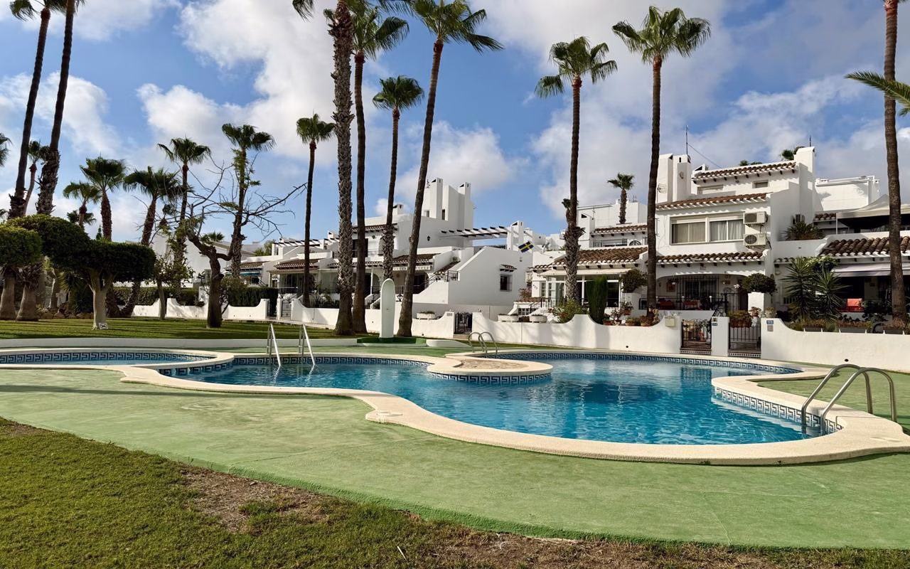 WV2608_2 Bedrooms TownHouse with comm. Pool, Glazed-in Terrace, Front and Back Garden, BBQ and Solarium_VILLAMARTIN | White Villas in Spain WhiteVillasInSpain01 7