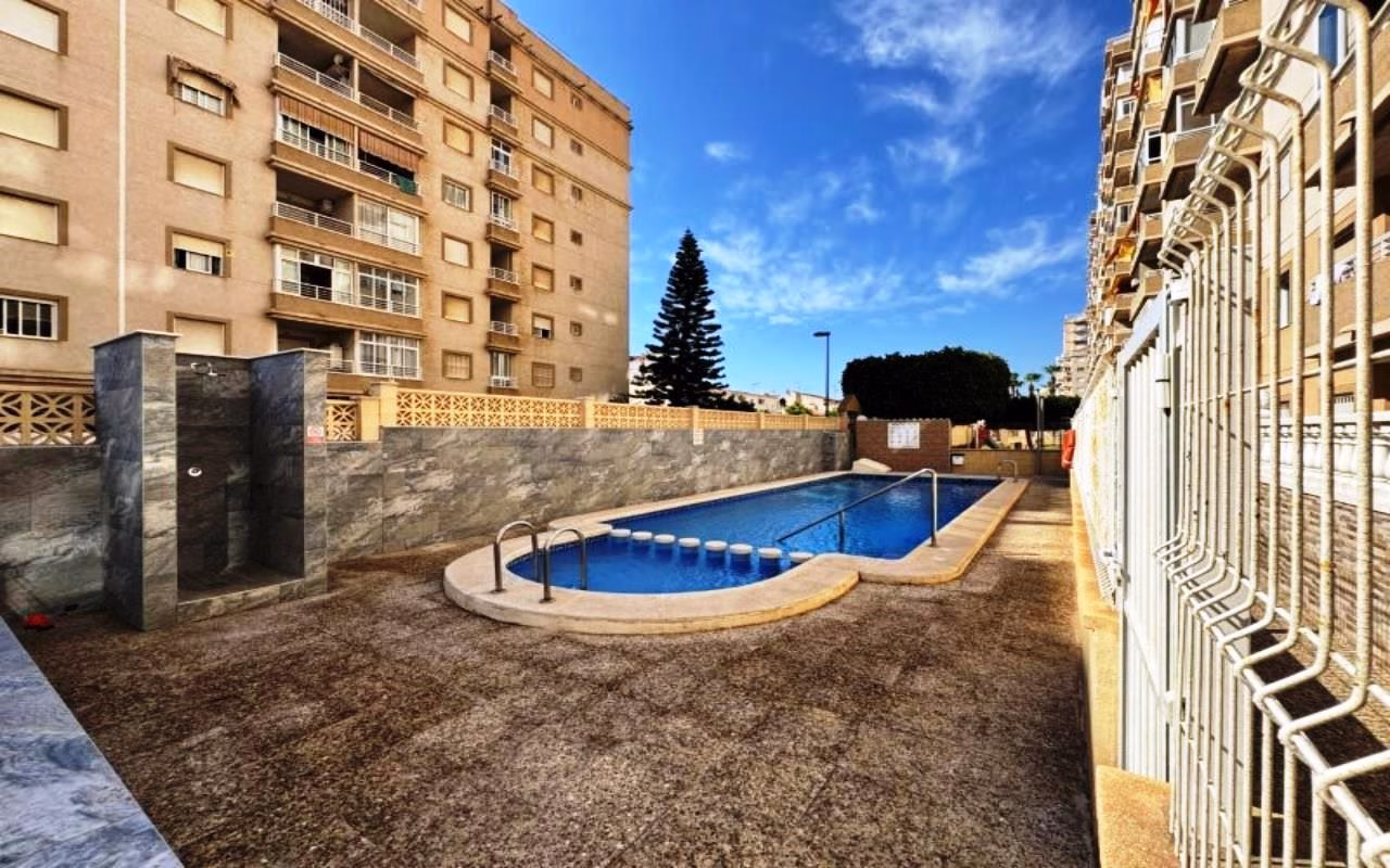 Ref: WSM1264 — TORREVIEJA – 2 Bedrooms Apartment on 8th Floor with Sea Views, Lift Access, 2 comm. Pools, Childrens playground and Parking | White Villas in Spain WhiteVillasInSpain07 27