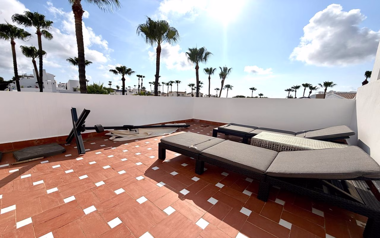 WV2608_2 Bedrooms TownHouse with comm. Pool, Glazed-in Terrace, Front and Back Garden, BBQ and Solarium_VILLAMARTIN | White Villas in Spain WhiteVillasInSpain23 4