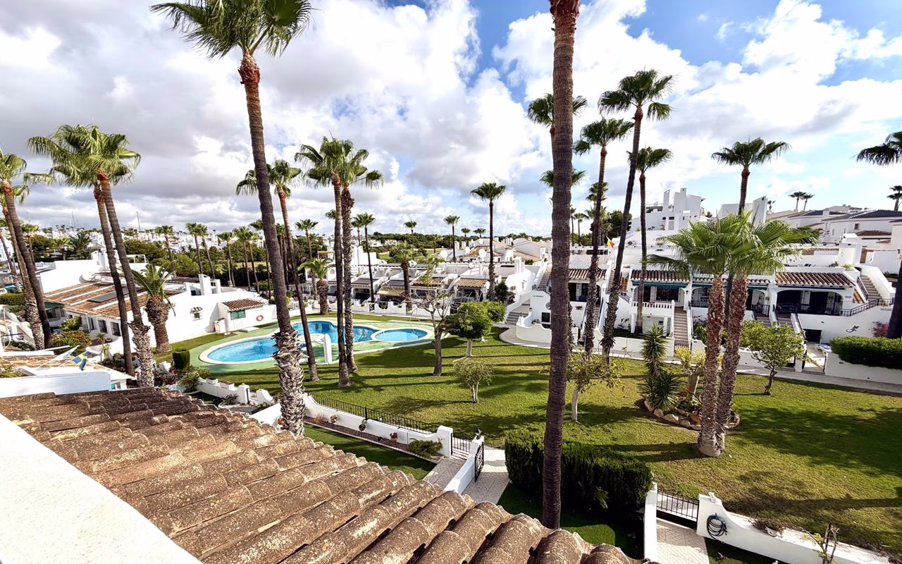 WV2608_2 Bedrooms TownHouse with comm. Pool, Glazed-in Terrace, Front and Back Garden, BBQ and Solarium_VILLAMARTIN | White Villas in Spain WhiteVillasInSpain24 4