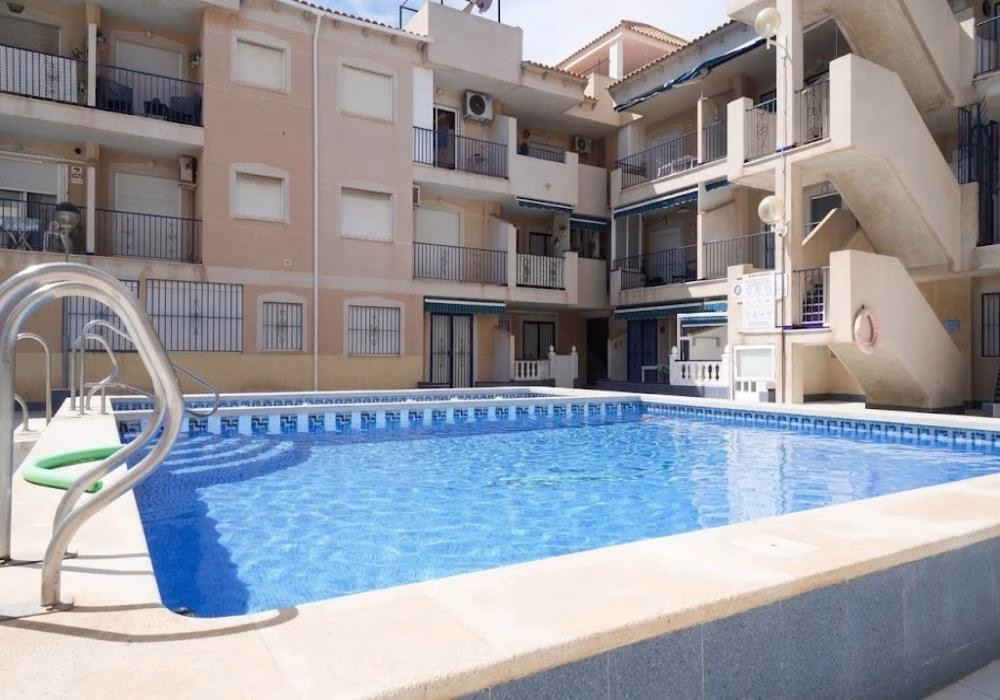 Ref: WTi3212 — TORREVIEJA (Naufragos Beach area) – 3 Bedrooms Apartment on 1st Floor with comm. Pool in Gated Residential, 100m to the Beach | White Villas in Spain WhiteVillasInSpain02 8