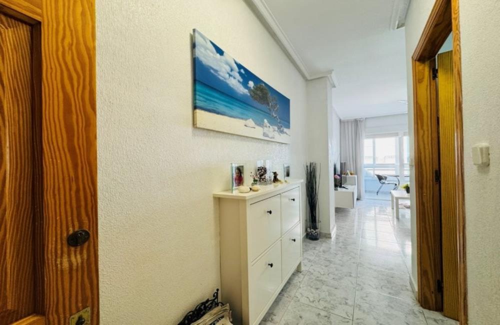 Ref: WSM1268 — LA MATA – 1 Bedroom Apartment on 2nd Floor with Lift, comm. Pool, Sea Views Terrace, Storage, 300m to the Beach. | White Villas in Spain WhiteVillasInSpain03 24
