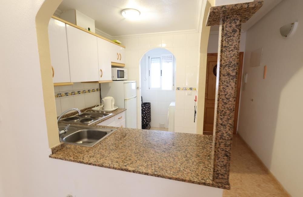Ref: WIH3049 — TORREVIEJA – 2 Bedrooms Apartment on 4th Floor with Lift, comm. Pool and Terrace, 550m to the Beach. | White Villas in Spain WhiteVillasInSpain04 22