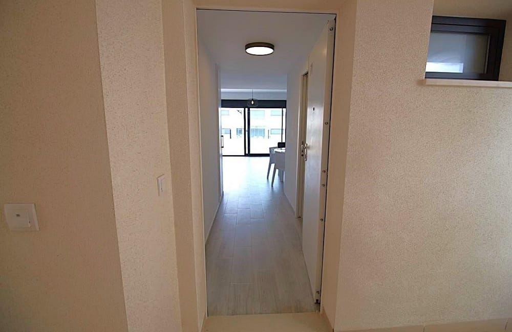 Ref: WV2622 — PLAYA FLAMENCA – 2 Bedrooms PentHouse with comm. Pool, Terrace, Solarium and Parking. | White Villas in Spain WhiteVillasInSpain04 23