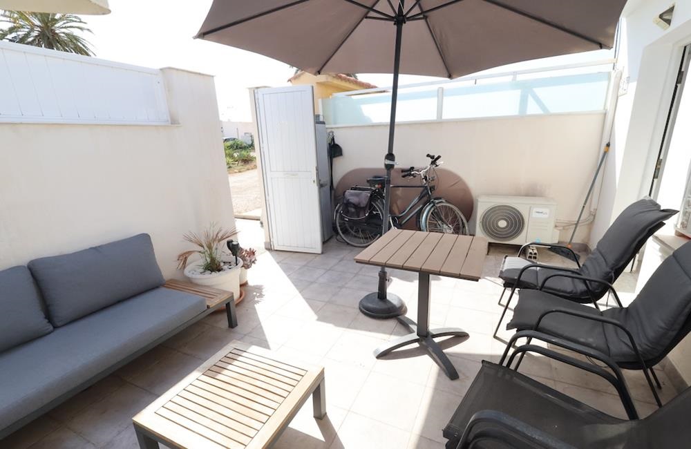 Ref: WIH3056 — TORREVIEJA – 3 Bedrooms Renovated Bungalow with comm. Pool, Parking and Solarium. | White Villas in Spain WhiteVillasInSpain04 28