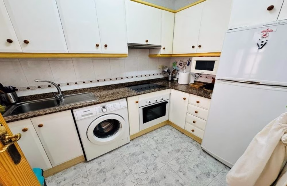 Ref: WSM1268 — LA MATA – 1 Bedroom Apartment on 2nd Floor with Lift, comm. Pool, Sea Views Terrace, Storage, 300m to the Beach. | White Villas in Spain WhiteVillasInSpain05 24