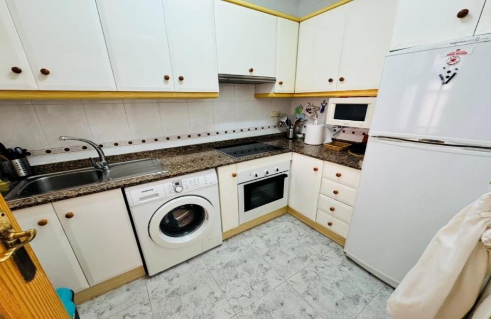 Ref: WSM1268 — LA MATA – 1 Bedroom Apartment on 2nd Floor with Lift, comm. Pool, Sea Views Terrace, Storage, 300m to the Beach. | White Villas in Spain WhiteVillasInSpain05 24