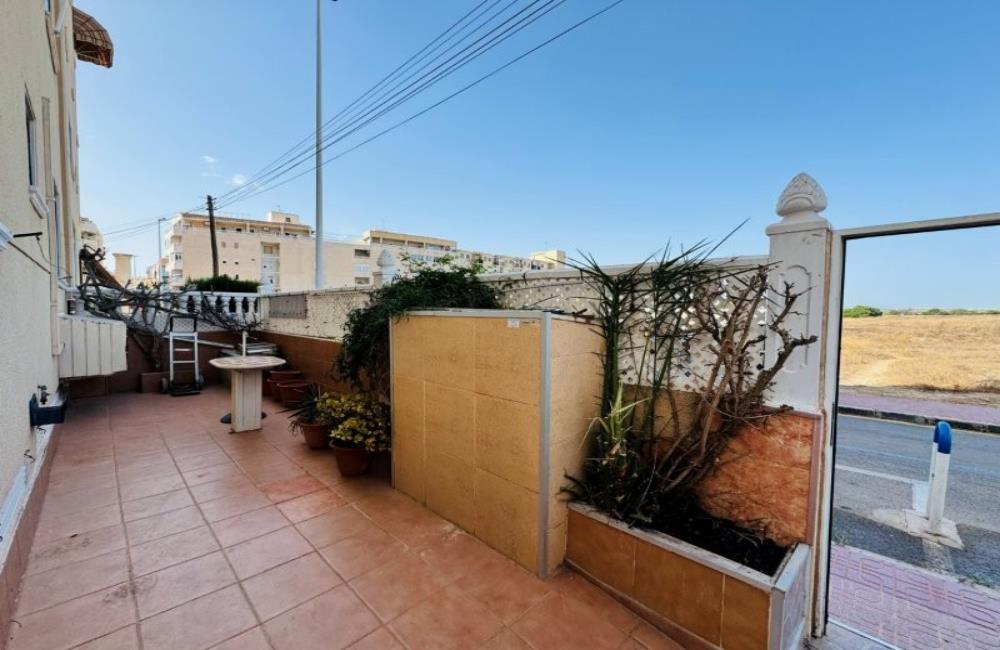 Ref: WSM1269 — LA MATA – 2 Bedrooms Ground Floor Apartment with comm. Pool, Glazed-in Terrace, Garage, 300m to the Beach. | White Villas in Spain WhiteVillasInSpain05 25