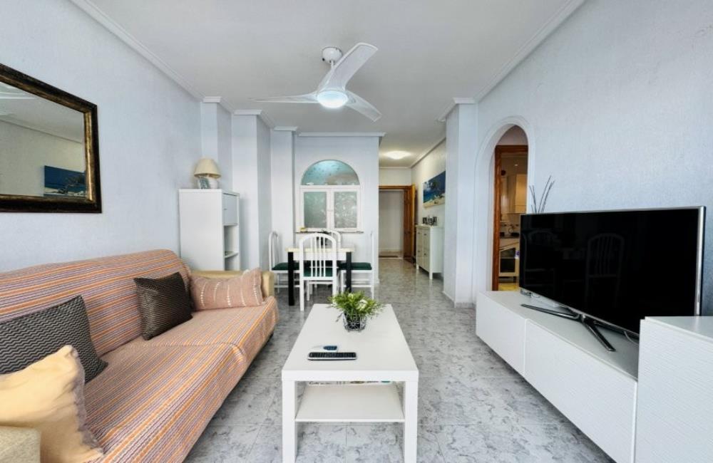 Ref: WSM1268 — LA MATA – 1 Bedroom Apartment on 2nd Floor with Lift, comm. Pool, Sea Views Terrace, Storage, 300m to the Beach. | White Villas in Spain WhiteVillasInSpain06 24