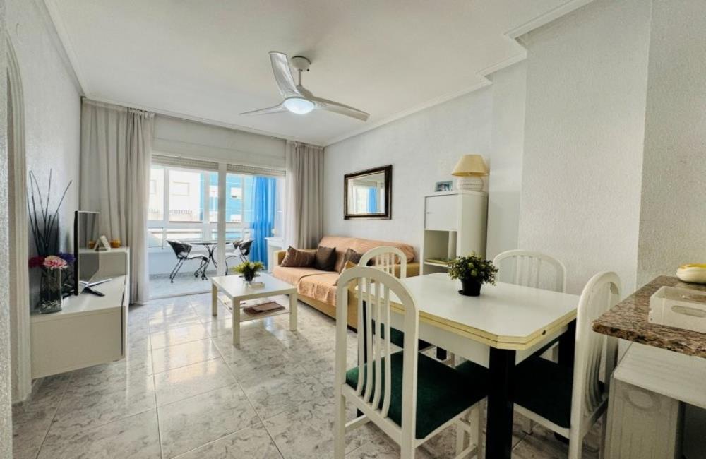 Ref: WSM1268 — LA MATA – 1 Bedroom Apartment on 2nd Floor with Lift, comm. Pool, Sea Views Terrace, Storage, 300m to the Beach. | White Villas in Spain WhiteVillasInSpain08 24