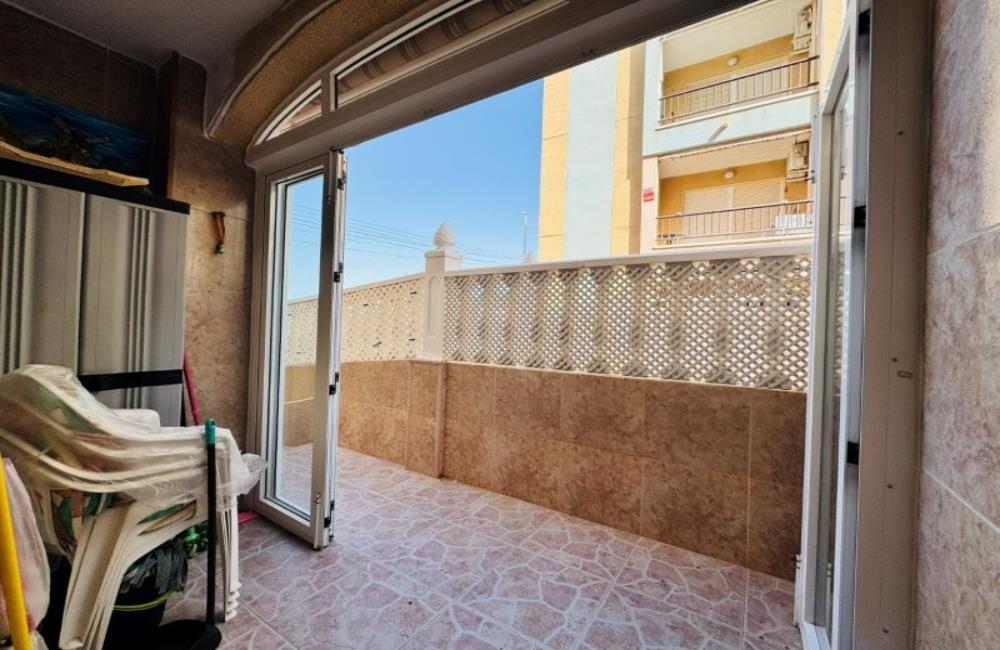 Ref: WSM1269 — LA MATA – 2 Bedrooms Ground Floor Apartment with comm. Pool, Glazed-in Terrace, Garage, 300m to the Beach. | White Villas in Spain WhiteVillasInSpain09 25