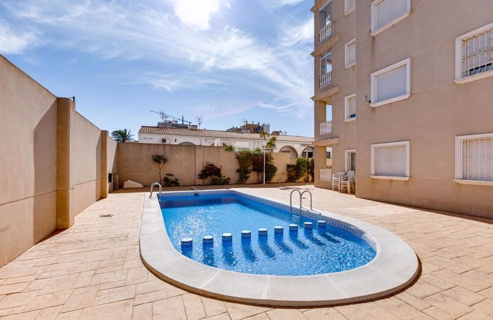 Ref: WM21044 — TORREVIEJA – 2 Bedrooms Apartment on 6th Floor with Lift, comm. Pool and Sea Views Terrace. | White Villas in Spain WhiteVillasInSpain09 26