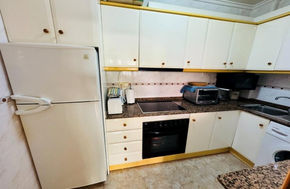 Ref: WSM1269 — LA MATA – 2 Bedrooms Ground Floor Apartment with comm. Pool, Glazed-in Terrace, Garage, 300m to the Beach. | White Villas in Spain WhiteVillasInSpain14 24