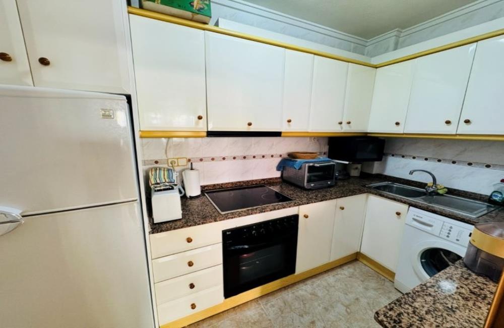 Ref: WSM1269 — LA MATA – 2 Bedrooms Ground Floor Apartment with comm. Pool, Glazed-in Terrace, Garage, 300m to the Beach. | White Villas in Spain WhiteVillasInSpain15 24