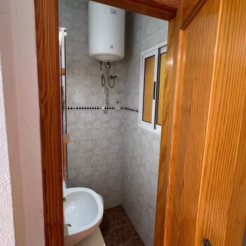 2 Bedrooms Semi-renovated Townhouse with comm. Pool, Front Terrace and Solarium with Lake views_TORRETA III,_TORREVIEJA